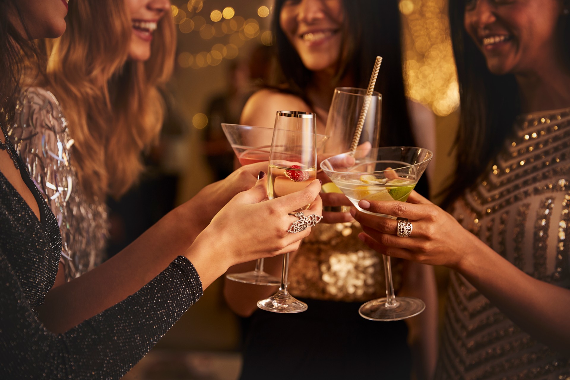 Female Friends Make Toast As They Celebrate At Party